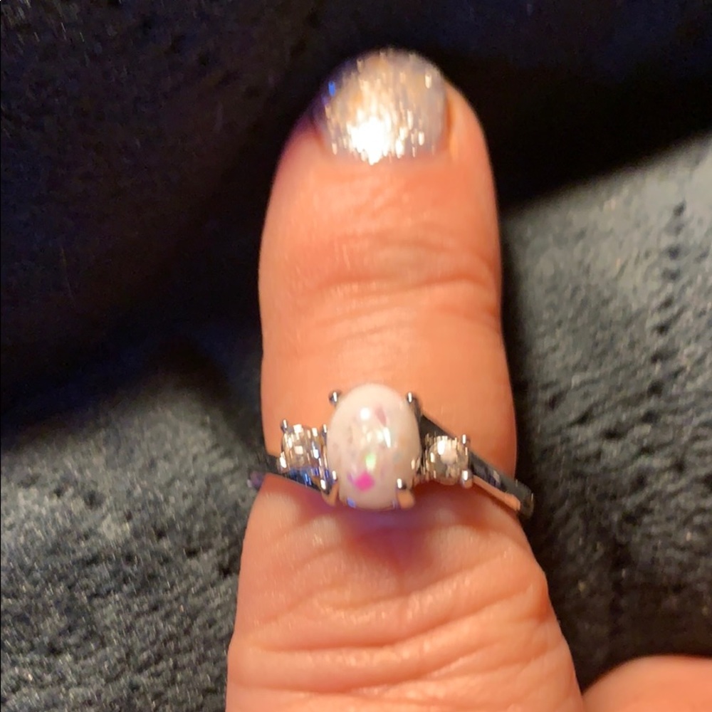 Small white oval opal ring size 7